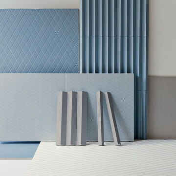 Großformatige Wandverkleidung mit Mutina Rombini Fliesen in Rautenstruktur, modernes Design in dezentem Blau mit dreidimensionaler Optik