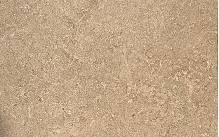 sandfarbene, strukturierte Bodenfliese, Nahaufnahme